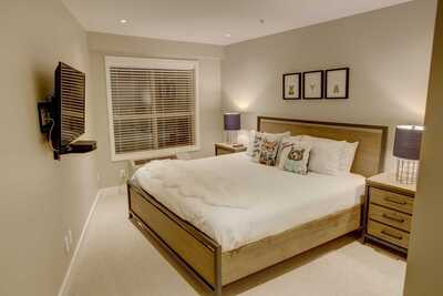 Master bedroom with king size bed and cable TV