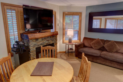 Dining area with gas fireplace and cable TV