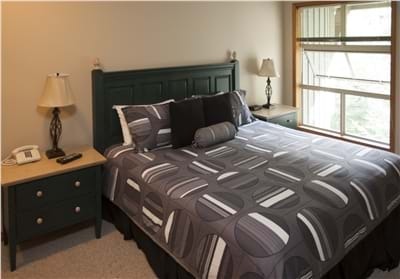 Master Bedroom with King Bed, TV & Ensuite