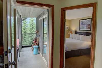 Master bedroom & private deck: view from the living room