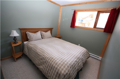 Cabin 2: bedroom with one queen bed